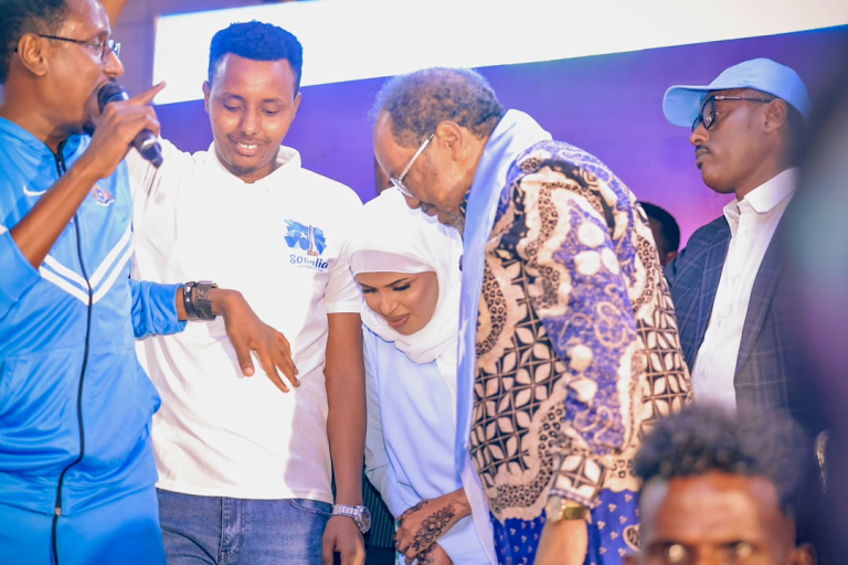 Abdiwali Omar and Xaawo Degan with President Hassan Sheikh Mohamud at Somalia's 66th Independence Day celebration in Taleex, Mogadishu.